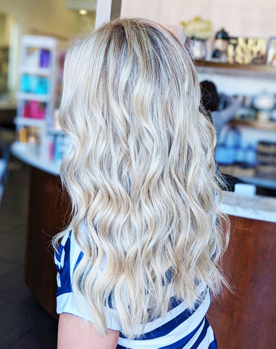 Wavy Platinum Blonde with Full Highlights